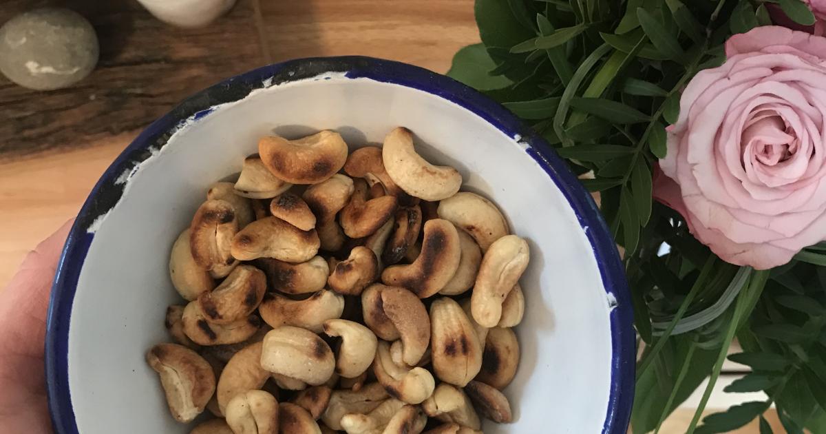 Do you know how to make the salt stick to roasted cashews?   You roast them on a medium heat for a while (maybe ten minutes) until nice and toasty then add a dash of the best water you can find and a good sprinkle of salt, mix, let evaporate and cool. There you go! 